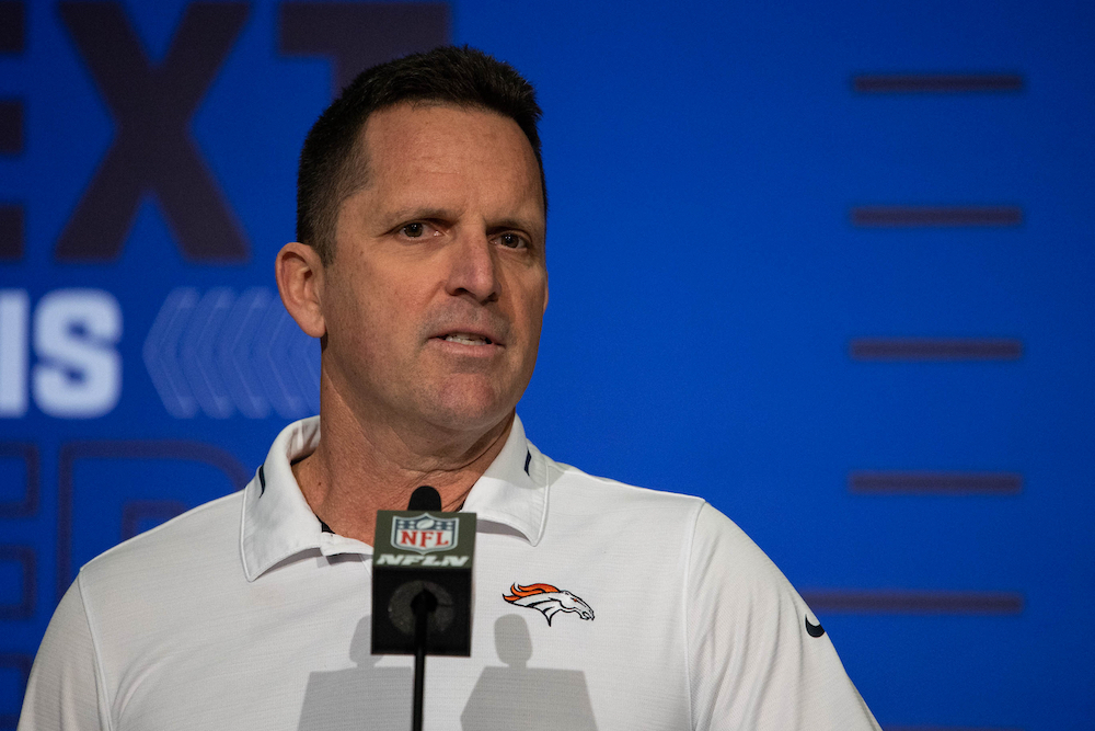 George Paton, general manager of the Denver Broncos, responds to questions  during a news conference on media day before the team officially opens an  NFL football training camp at Broncos headquarters Tuesday